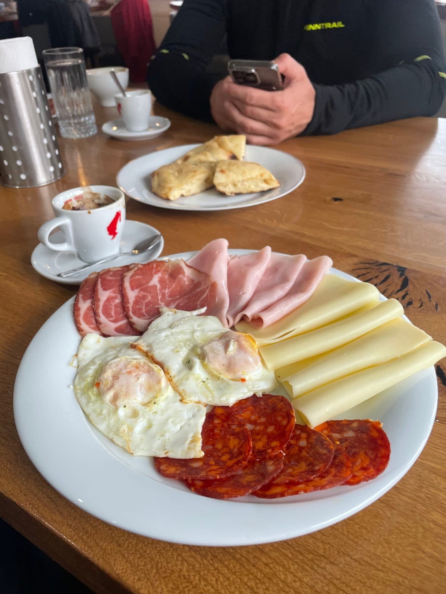 Breakfast spread of local cheese and cured meats before a day on the water
